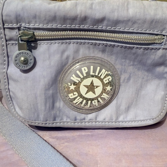 Kipling Crossbody bag. Lavender. Glitter in emblem. - Picture 9 of 11